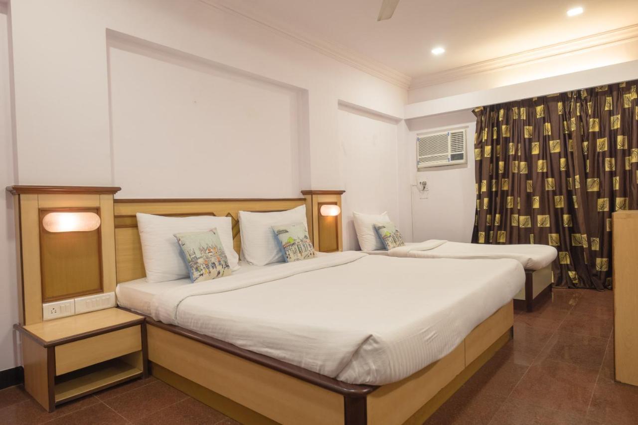 Oyo Flagship 561 Host Inn Mumbai Bagian luar foto